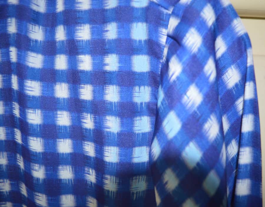 manche chemisier bleu